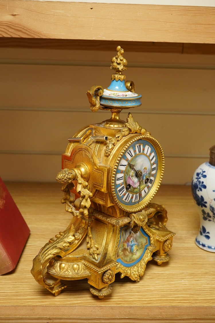 A late 19th century French Sevres style ormolu mantel clock, 31cm